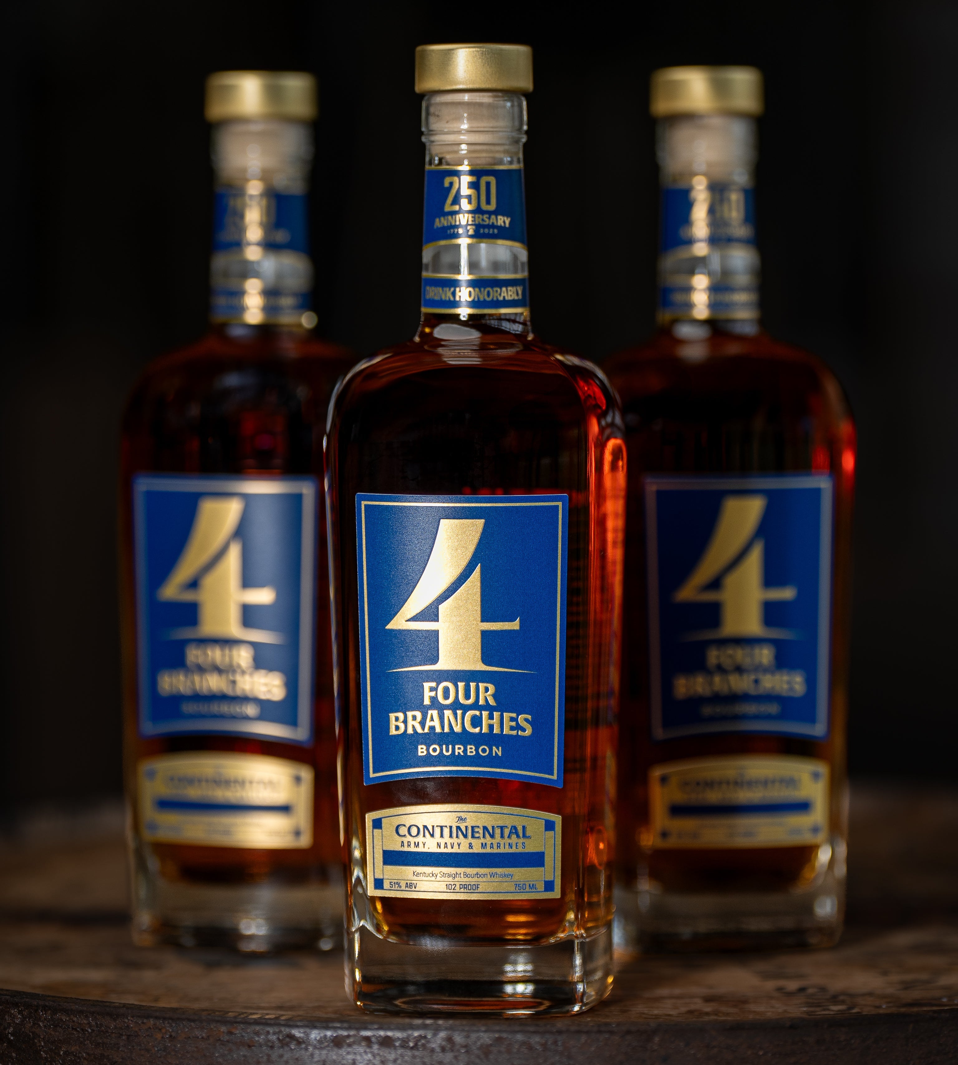 "The Continental limited-edition bourbon bottle by Four Branches Bourbon, commemorating 250 years of the U.S. Army, Navy, and Marines."